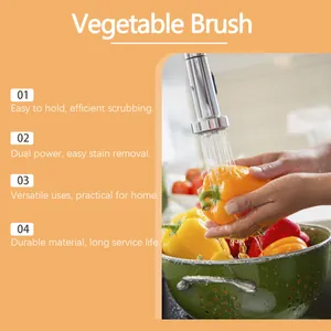 Action shot of vegetable brush cleaning a yellow bell pepper under running water