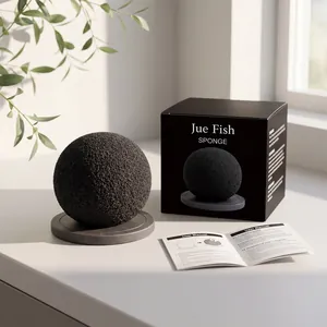 Detailed view of the JUE FISH cleaning sponge kit including black box and manual