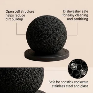 Macro detail of black porous cleaning sponge ball safe for nonstick cookware and glass