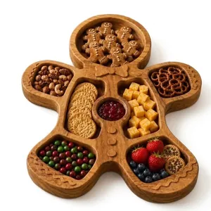 Wooden gingerbread man shaped divided tray for Christmas snacks and party appetizers