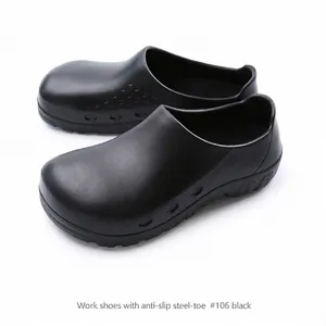 Close-up detail of professional black anti-slip steel-toe work shoes with side ventilation