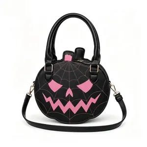 Front view of a black Halloween pumpkin handbag with a pink Jack-o'-lantern face