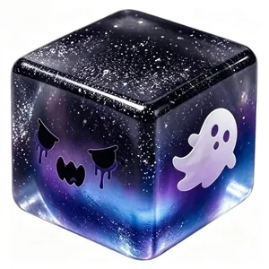 Close-up of galaxy print Halloween spooky squishy cube with cute white ghost pattern