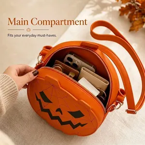 Spacious main compartment of the orange Halloween pumpkin handbag for essentials.