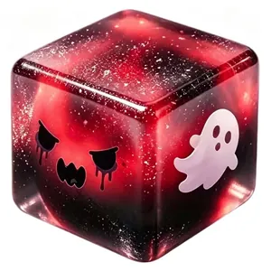 Macro detail of red translucent galaxy Halloween spooky squishy cube featuring a ghost graphic