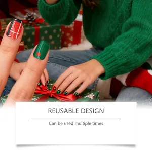 Detailed view of Christmas themed red and green soft gel nail stickers with reusable design