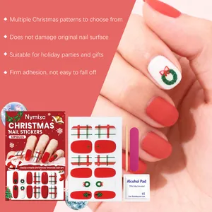 Detailansicht des Nymixa Weihnachts-Nagelsticker-Sets mit Werkzeugen und Design