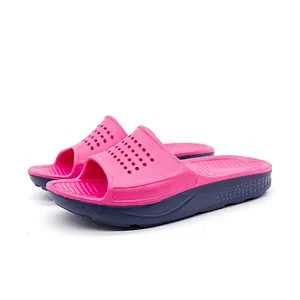 Lightweight pink and navy blue non-slip slides for versatile indoor and outdoor use