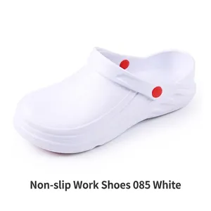Side view of white non-slip work clogs with red button accents for kitchen and medical use