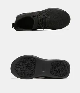 Top and anti-slip sole view of black breathable waterproof chef work shoes for kitchen