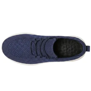 Top view detail of navy blue breathable non-slip work shoes with white sole