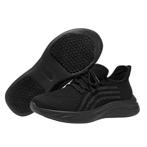 Breathable non-slip black chef work shoes showing detailed anti-skid outsole pattern