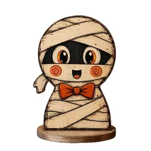 Cute wooden mummy character tabletop decoration for Halloween with orange bowtie and base