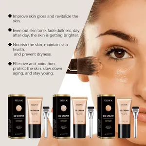 Detail view of moisturizing DD cream with SPF 15 and makeup brush for smooth skin tone