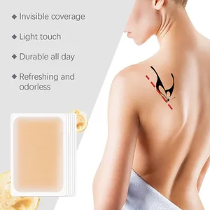 Detail of waterproof concealer patch covering a back tattoo with invisible finish
