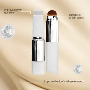Detail of 2-in-1 foundation stick with brush for even skin tone.