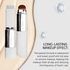 Detail view of 2-in-1 ivory foundation stick with brush and creamy texture