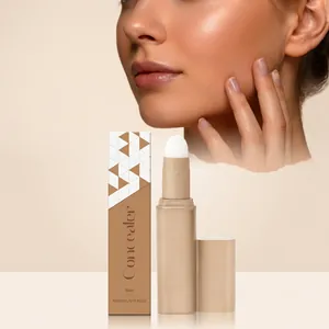 Detailed view of silky liquid concealer stick and packaging box on skin tone background
