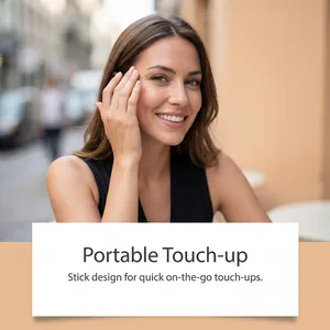 Smiling woman demonstrating the portable concealer foundation stick for quick touch-ups