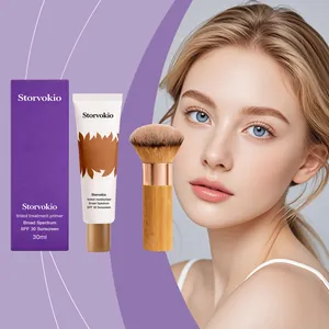 Detail of tinted moisturizer set including applicator brush and model's flawless skin