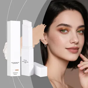 Detailed view of natural shade foundation stick with smooth cream texture swatch
