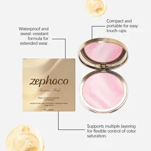 Gros plan sur l'enlumineur rose scintillant, le boîtier et la boîte dorée élégante.