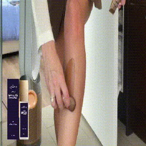 Detail of zephoco body concealer being applied to leg for natural blemish coverage