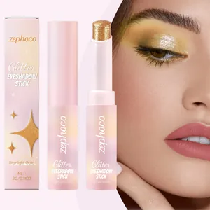 Close-up of Zephoco glitter eyeshadow stick in Starlight Gold with model application effect