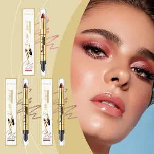 Primer plano de maquillaje de ojos brillante con lápices de sombra de ojos dobles