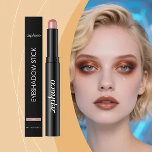 Close-up view of a shimmer rose eyeshadow stick with a professional model makeup look