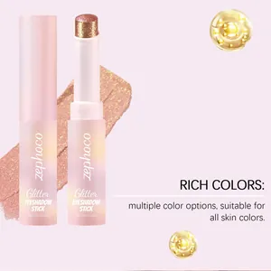 Detail view of Zephoco glitter eyeshadow stick showing sparkling texture and rich gold color.