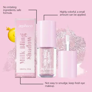 Liquid glitter eyeshadow with applicator wand and pink retail packaging box view