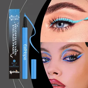 Detail view of blue UV neon liquid eyeliner pen with precision tip and Halloween themed packaging