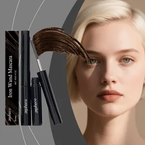 Close-up of Zephoco brown mascara iron wand and packaging with model eye makeup view