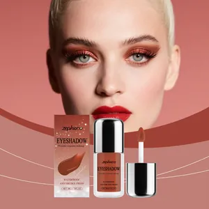 Shimmering burgundy liquid eyeshadow detail with applicator and model's eye makeup
