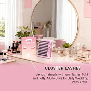 Kit de faux cils en grappes sur une coiffeuse rose pour un regard naturel et volumineux