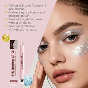 Detailed view of silver cream eyeshadow stick with shimmering makeup effect on model
