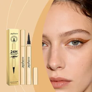 Close-up of light brown liquid eyeliner effect on model's eye showing smooth strokes.