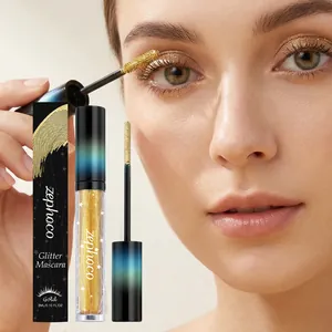 Close-up of gold glitter mascara application and product packaging for party eye makeup