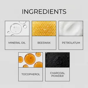 Detailed view of eyeliner ingredients: beeswax, mineral oil, petrolatum, and charcoal powder