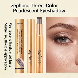 Close-up of Zephoco three-color eyeshadow stick with pearlescent earth tones makeup
