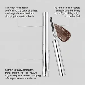 Close-up of curling mascara brush with brown formula and product feature descriptions