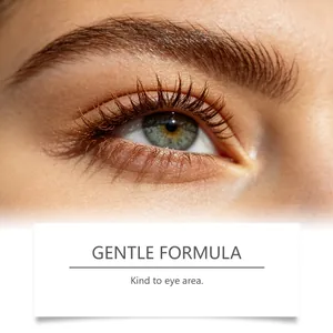 Detailed close-up of brown curled eyelashes with gentle formula mascara application