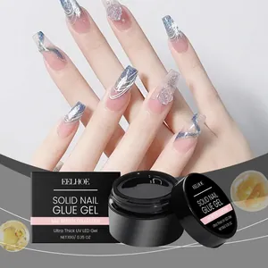 Primer plano detallado del pegamento para uñas sólido ultra grueso EELHOE y su envase original