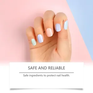 Macro view of pastel color dopamine nail stickers on fingers for healthy nail care