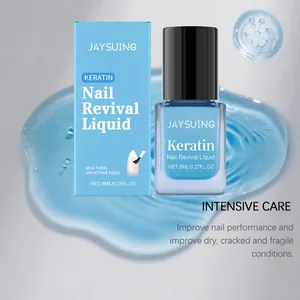 Detailansicht der JAYSUING Keratin Nagelpflegeflasche und Box auf blauem Spritzerhintergrund