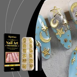 Detailed view of Nymixa gold nail art charms with star and moon shapes and tool kit