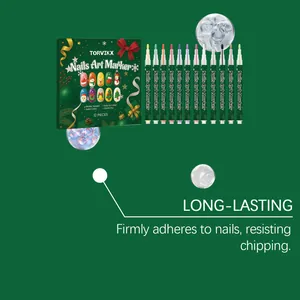Detail showing 12-piece Christmas nail art marker set with quick-dry water-based ink