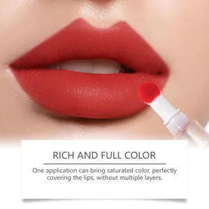Macro detail of rich matte red liquid lipstick applied on lips with applicator