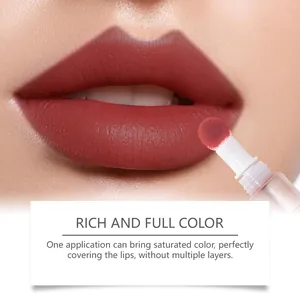 Detailed macro view of matte rose red liquid lipstick with a rich velvet finish texture